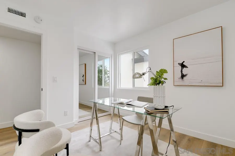 Home office with glass desk