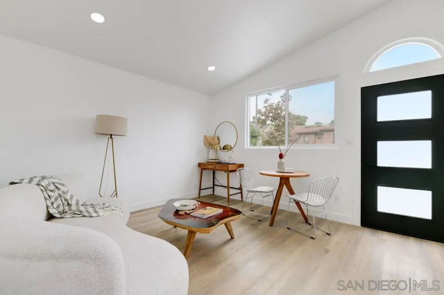ADU living space with black front door