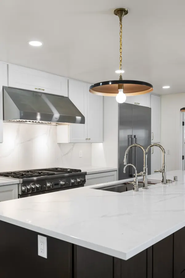 Kitchen range, hood and island faucets