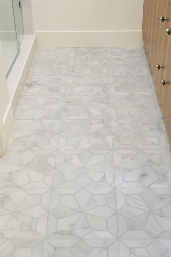 Geometric marble bathroom floor tile