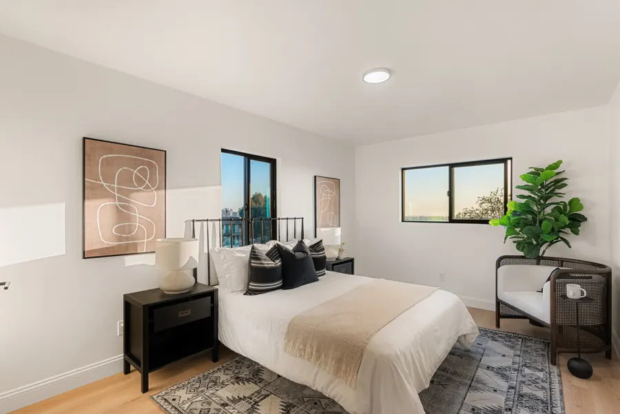 Bedroom with corner windows
