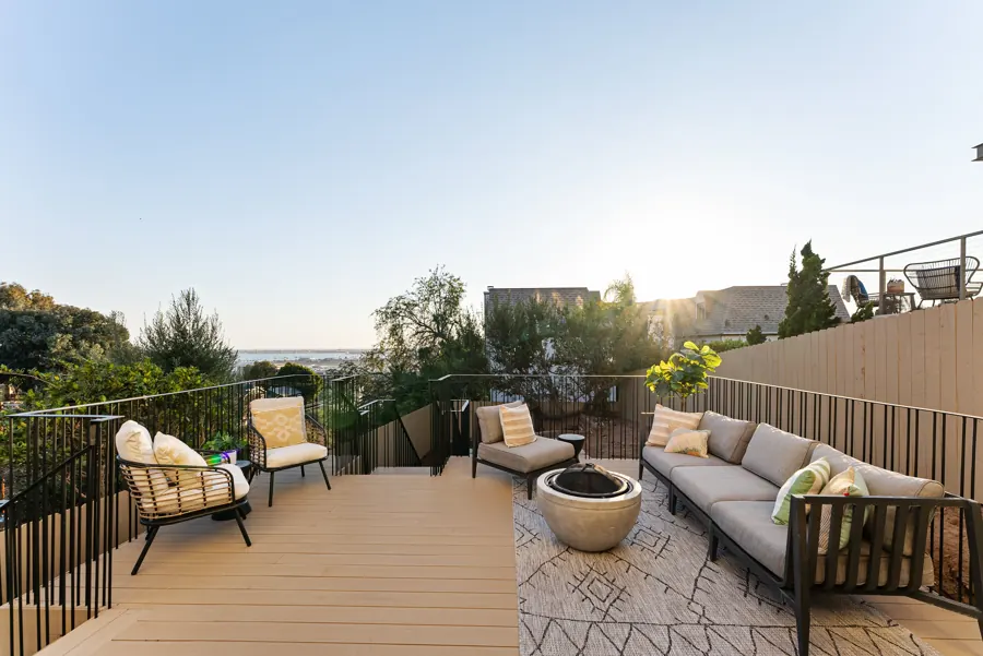 Rear deck with seating and bay view