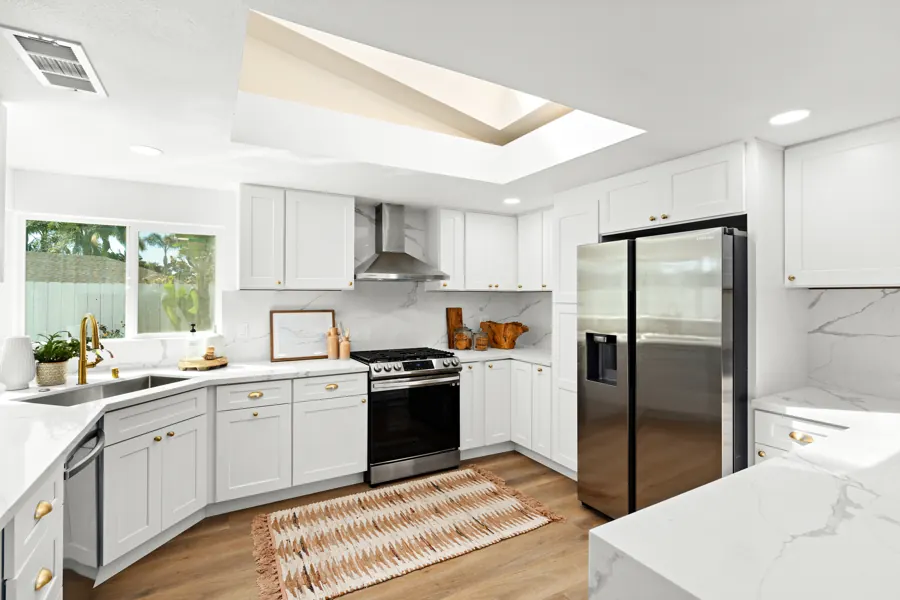Kitchen range wall under a skylight